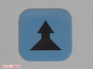 Druktoetslabel Ergo Blauw met zwarte pijl 2 snelheid