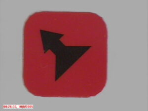 Druktoetslabel Ergo Rood met zwarte pijl 2 snelheid