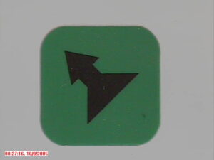 Druktoetslabel Ergo Groen met zwarte pijl 2 snelheid