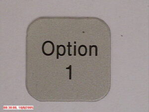 Druktoetslabel Ergo Zilver met Zwarte Optie 1