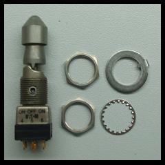 Tuimelschakelaar T-0-R met mech. interlock naar R stand